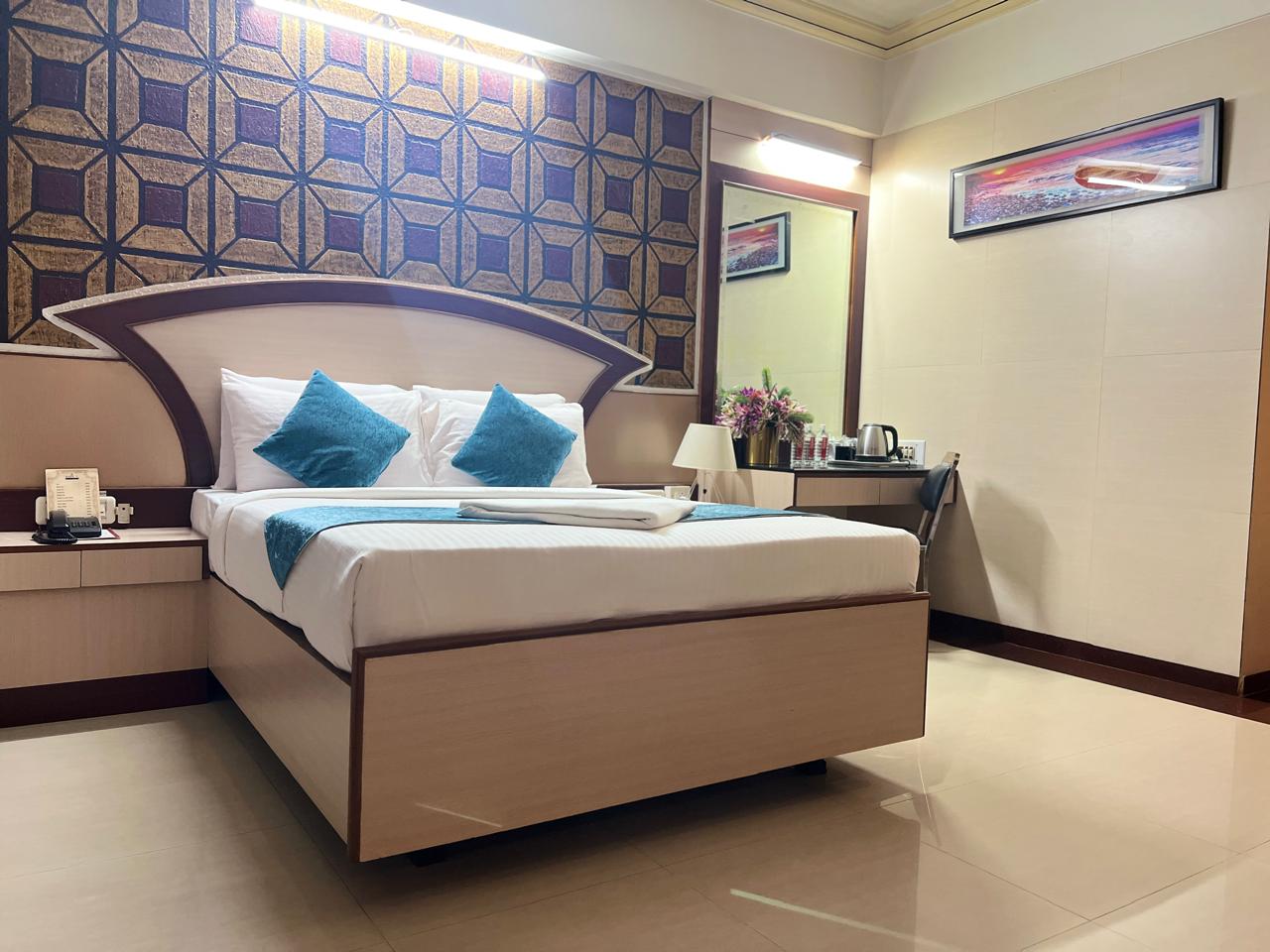 The Grand Krisha Rooms - Tap to explore photos