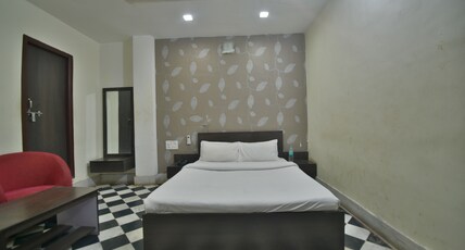 THE WHITECITY GUEST HOUSE Room Type - Deluxe Room