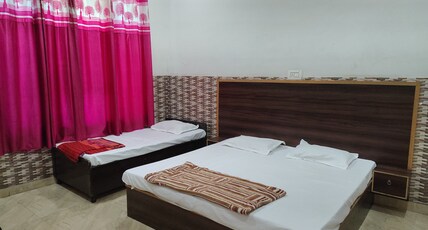 Guest House Tushar Room Type - Triple bedroom (1 Double bed + 1 single bed) Guest House Tushar Room Type - Triple bedroom (1 Double bed + 1 single bed)