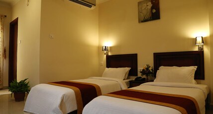 Hotel Nakshatra Regency Koppam Room Type - Deluxe Twin Bed AC
