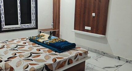 Shri Mahalaxmi Hotel Room Type - Deluxe Room