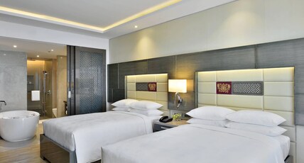 JW Marriott Mumbai Sahar Room Type - Executive Lounge Access, 2 Doubles, Pool View with Bathtub, One-way Airport Transfer