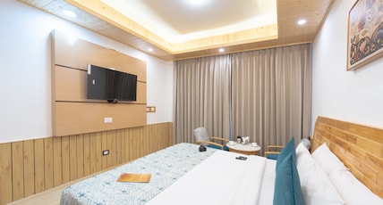 Snow Peak Retreat & Cottages (Centrally Heated- Hill View) Room Type - Deluxe Room (without balcony) Air Conditioned-Centrally Heated Snow Peak Retreat & Cottages (Centrally Heated- Hill View) Room Type - Deluxe Room (without balcony) Air Conditioned-Centrally Heated