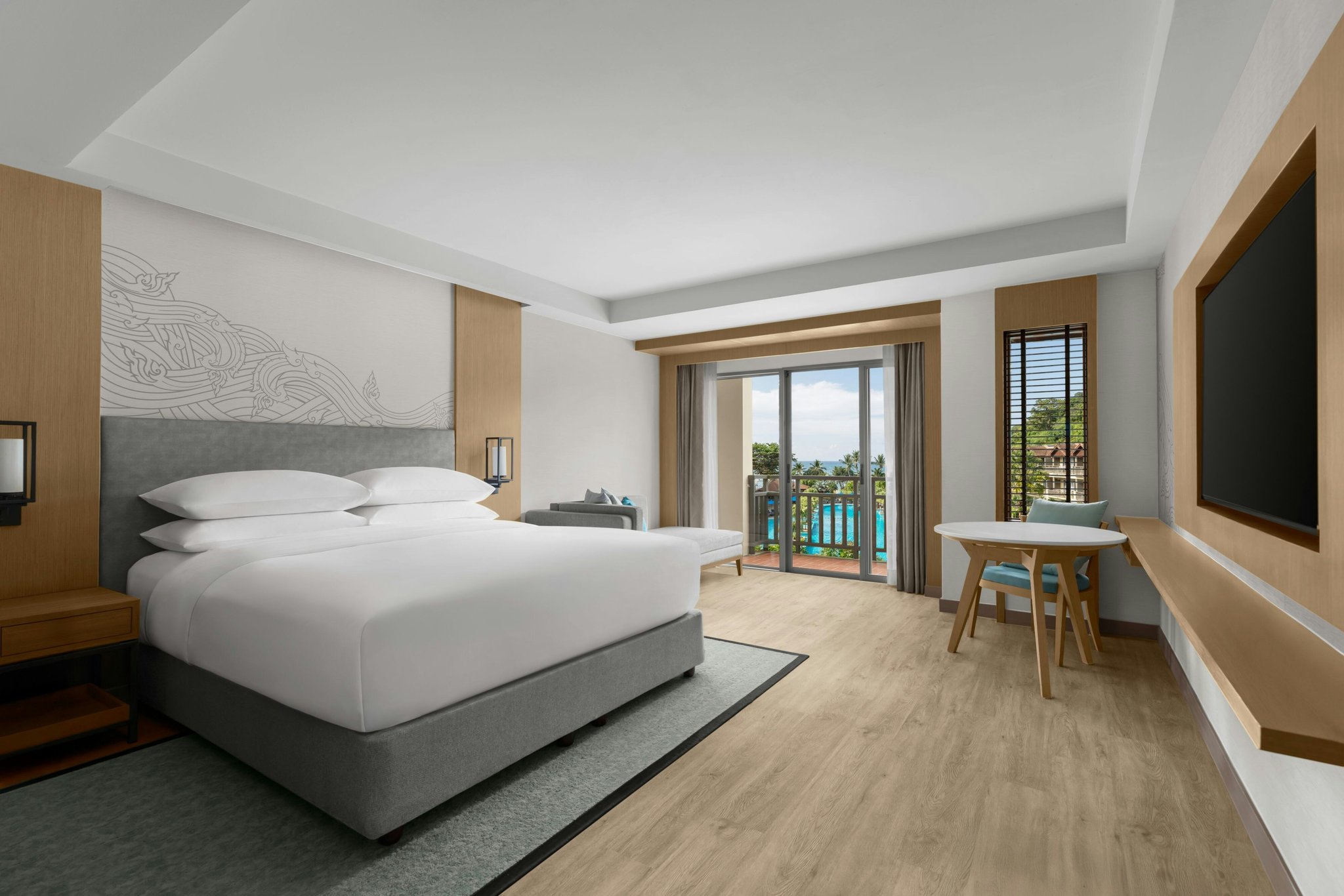 Phuket Marriott Resort & Spa, Merlin Beach - Tap to explore photos