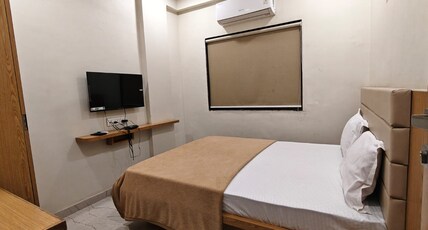 Hotel Sai Pratham Room Type - Deluxe Double Bed AC Hotel Sai Pratham Room Type - Deluxe Double Bed AC