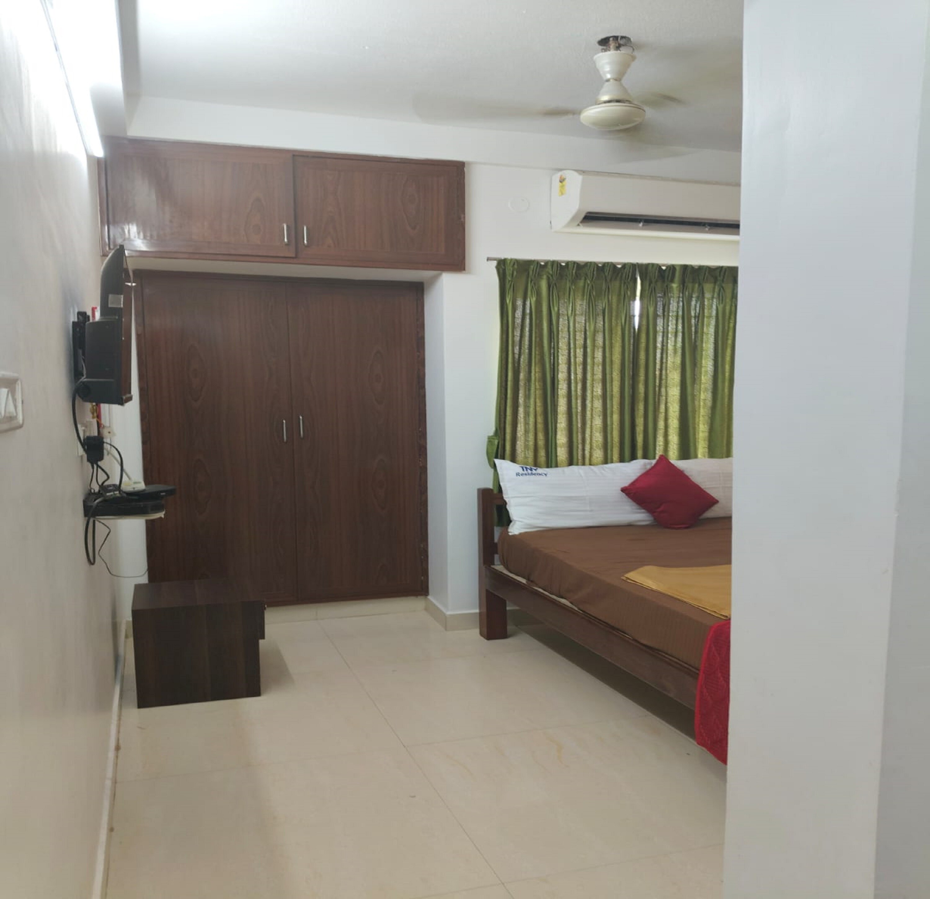 TNV RESIDENCY & A/C BAR - Tap to explore photos