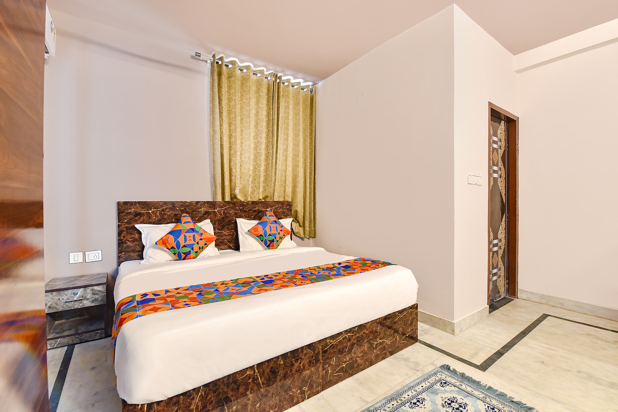 FabHotel Blue Prime - Nr Suvira Hospital - Tap to explore photos