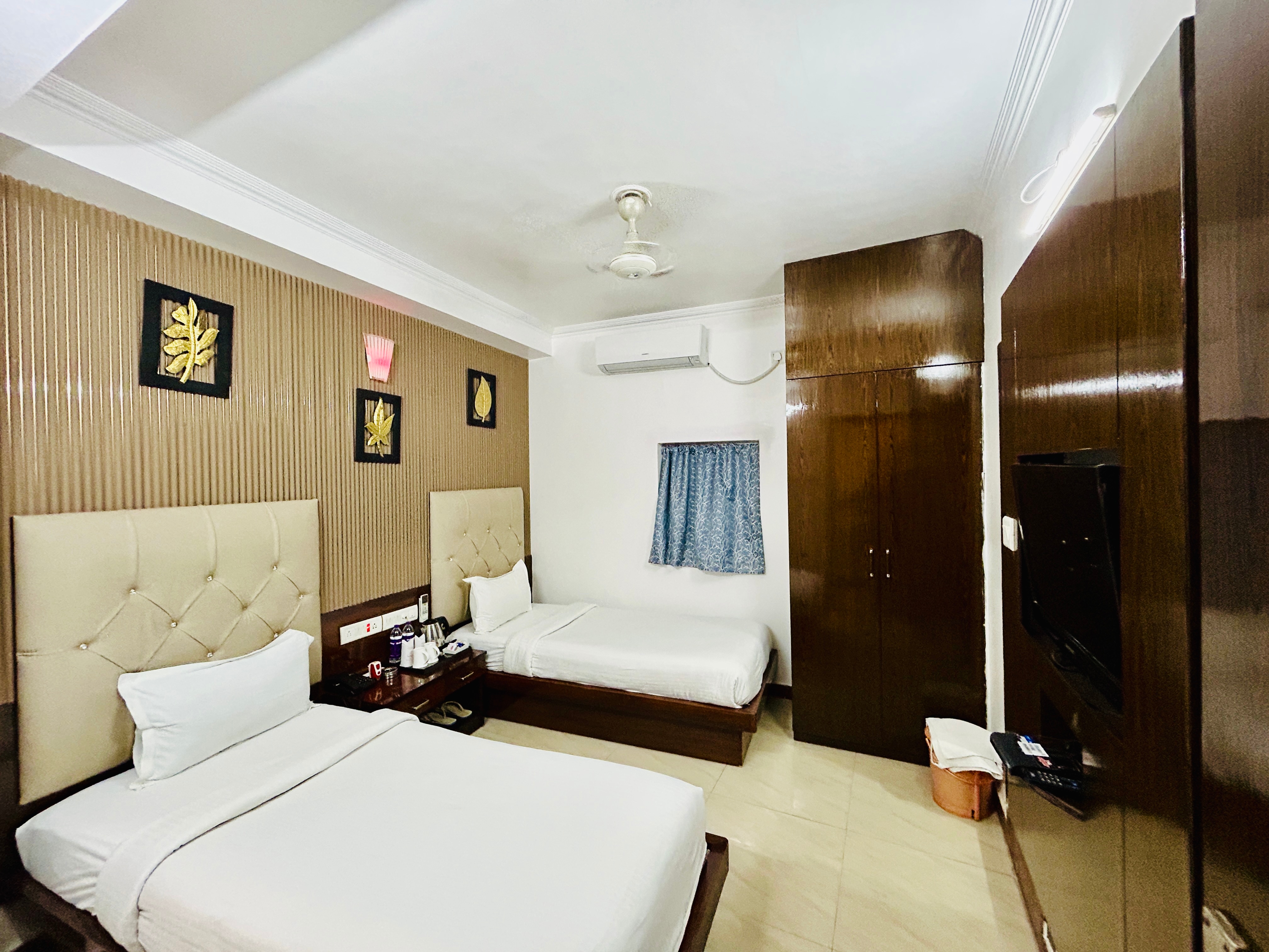 Hotel Tathagat - Tap to explore photos