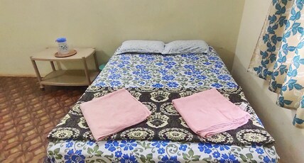 a latent farm stay Room Type - NON AC STANDARD ROOM WITH GARDEN VIEW