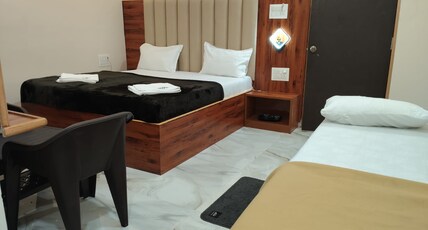 NANDI RESIDENCY Room Type - deluxe triple bed
