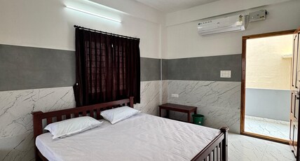 VIBIN RESIDENCY Room Type - Deluxe Room AC