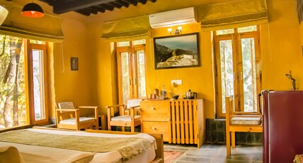 Prakriti Aalay - River side Mountain view Resort Room Type - King room with balcony