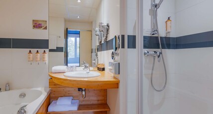 Mercure Lyon Est Villefontaine Room Type - Privilege room with sofa