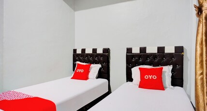 Hotel O Home Stay Kembar Syariah Room Type - Indonesia Standard Twin Hotel O Home Stay Kembar Syariah Room Type - Indonesia Standard Twin
