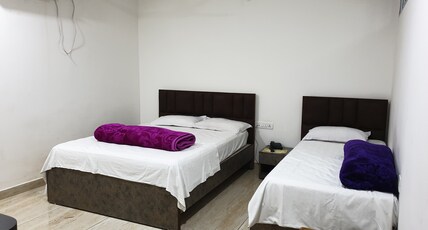 HOTEL SATYAM JAIGAON Room Type - Tripple Deluxe AC room