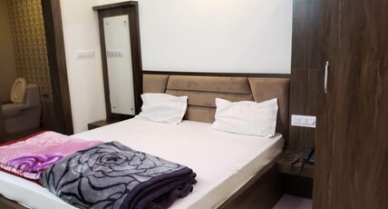 Hotel Sanskar Room Type - Deluxe Room AC