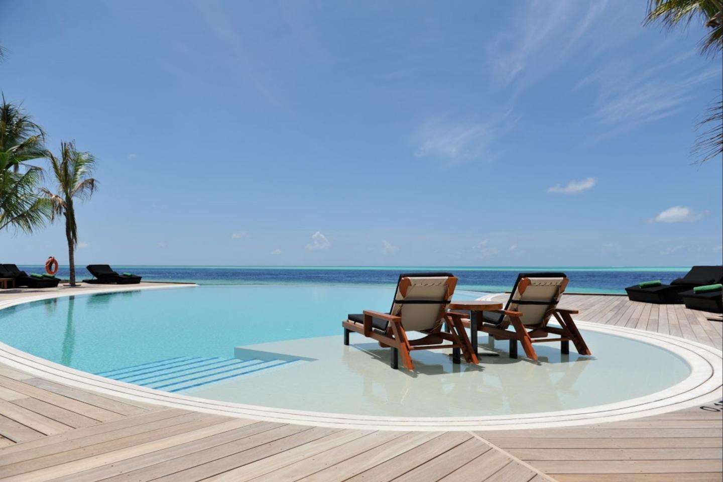 Komandoo Maldives Island Resort - Tap to explore photos