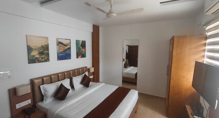 SUBURBAN RESIDENCY Room Type - Deluxe Room with Air Conditioning