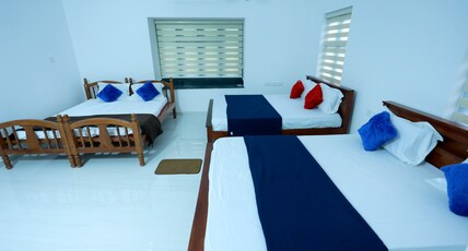 Nirmalyam (Gold homestay) Room Type - AC Family Room 203