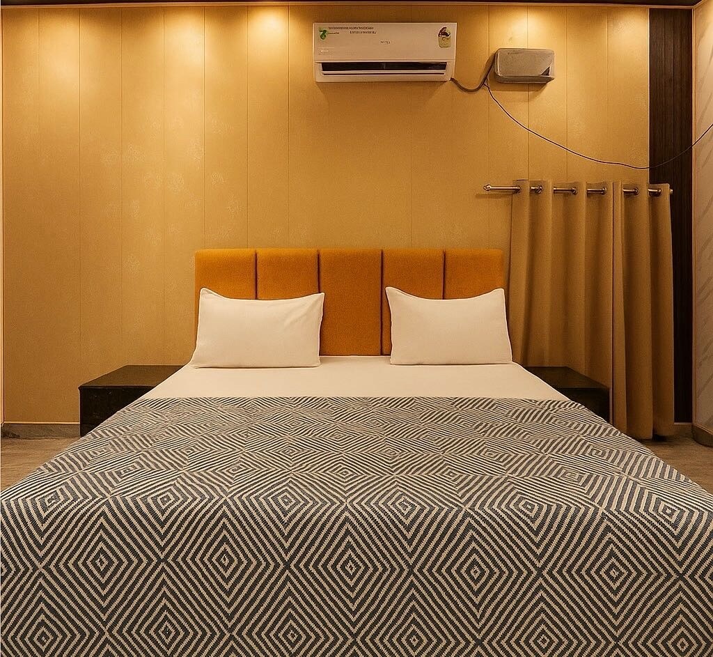 Hotel O by OYO The Family Palace - Tap to explore photos
