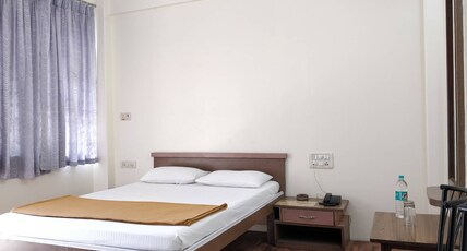Hotel Sangam Residency Room Type - Deluxe Room