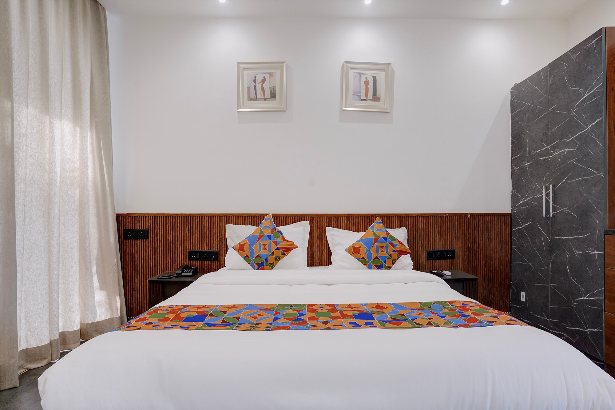 FabHotel JM Residency - Tap to explore photos
