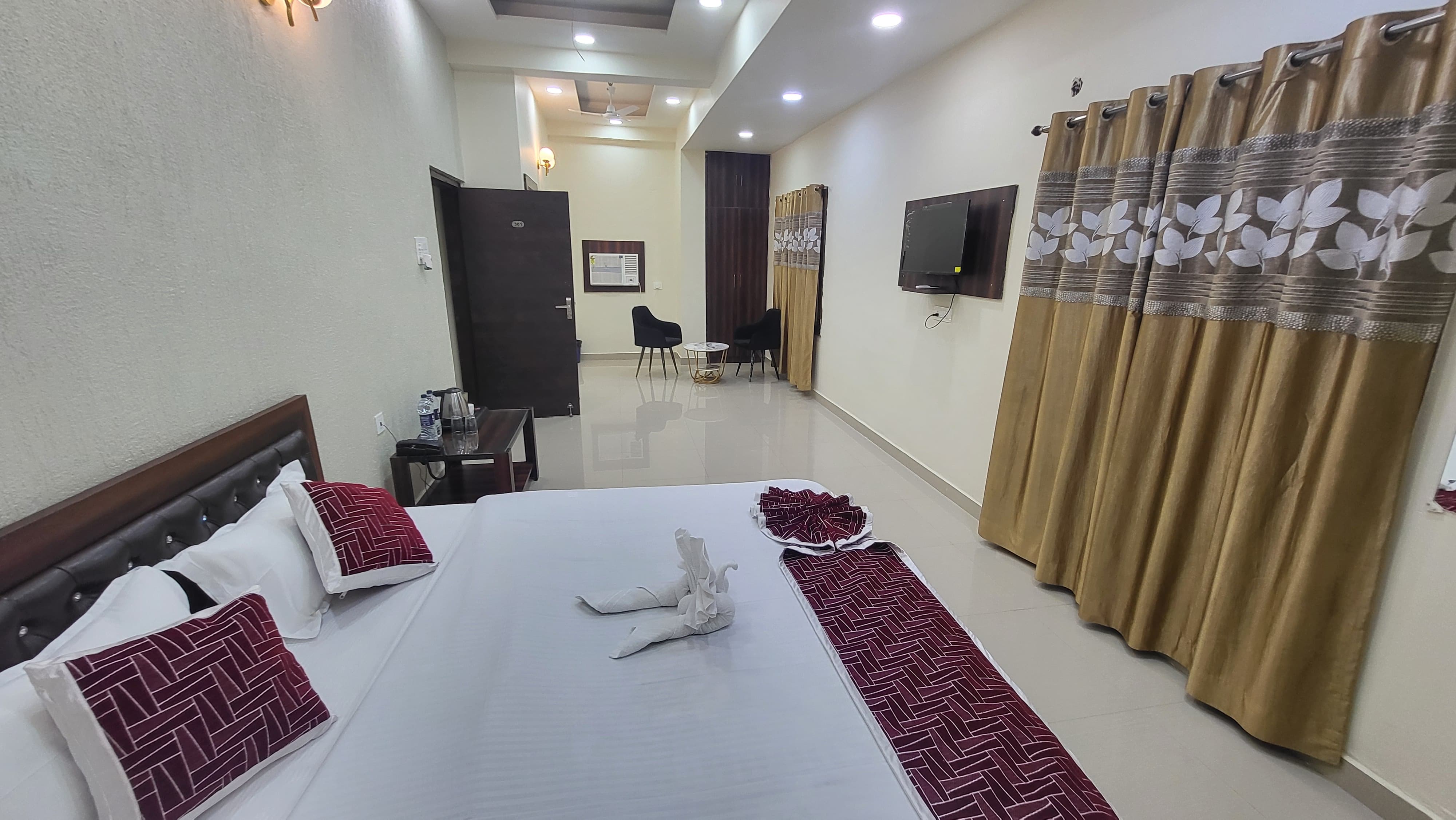 Hotel Adarsh | Near Saguna More - Tap to explore photos