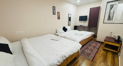 Stay Inn Kailasha | Parking Terrace Kitchen Room Type - Deluxe Family AC Room