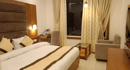 Hotel Prime Residency Room Type - Deluxe Room AC