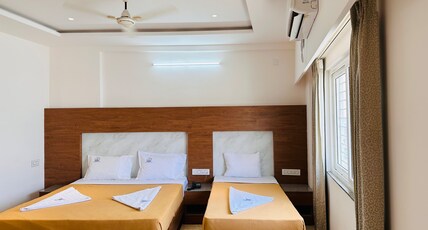 SLN Pride Room Type - Deluxe Triple Non-AC Room