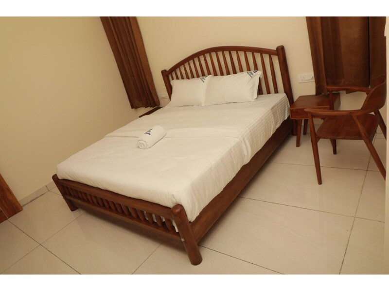Nilgiri Woodlands Luxury Service Apartment - 2BHK Apartments - Tap to explore photos