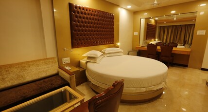 Hotel Ravikiran Room Type - AC Super Deluxe with Round Bed