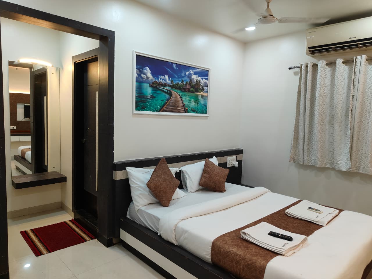 Hotel Dwarka - Tap to explore photos