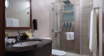 DoubleTree by Hilton Muscat Qurum Room Type - KING THREE BEDROOM SUITE DoubleTree by Hilton Muscat Qurum Room Type - KING THREE BEDROOM SUITE