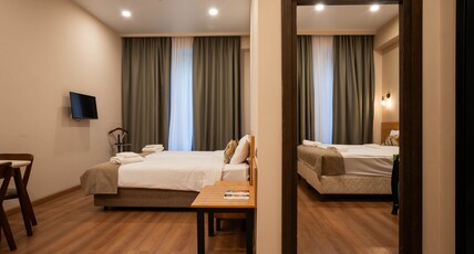 Hotel Bakuriani Inn Room Type - Family Room Back View With Kitchen