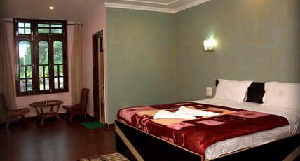 Hotel The Woodz Room Type - Luxury Room Non AC Non Balcony 