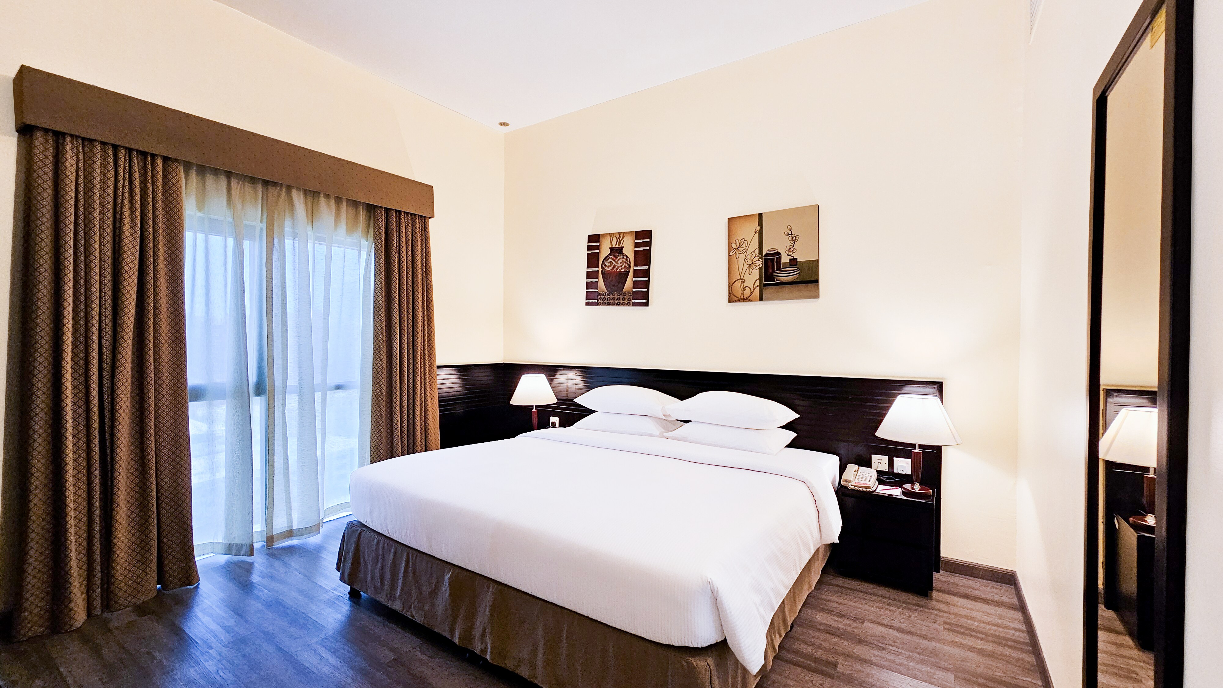 Ramada Hotel & Suites by Wyndham Ajman - Tap to explore photos