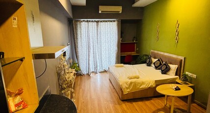 The Forest stays | studio apt at gaur City mall Room Type - Bedroom