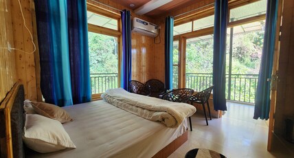River View Villa A Boutique Stay Room Type - Deluxe room with River View and Balcony AC