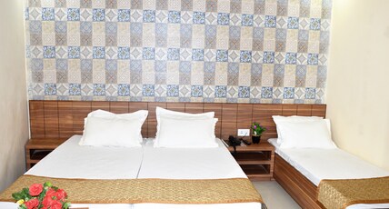 HOTEL ATA INN & RESTAURANT (20 mts FROM DARGAAH) Room Type - Normal Non AC Triple Bed (SMALL SIZE)
