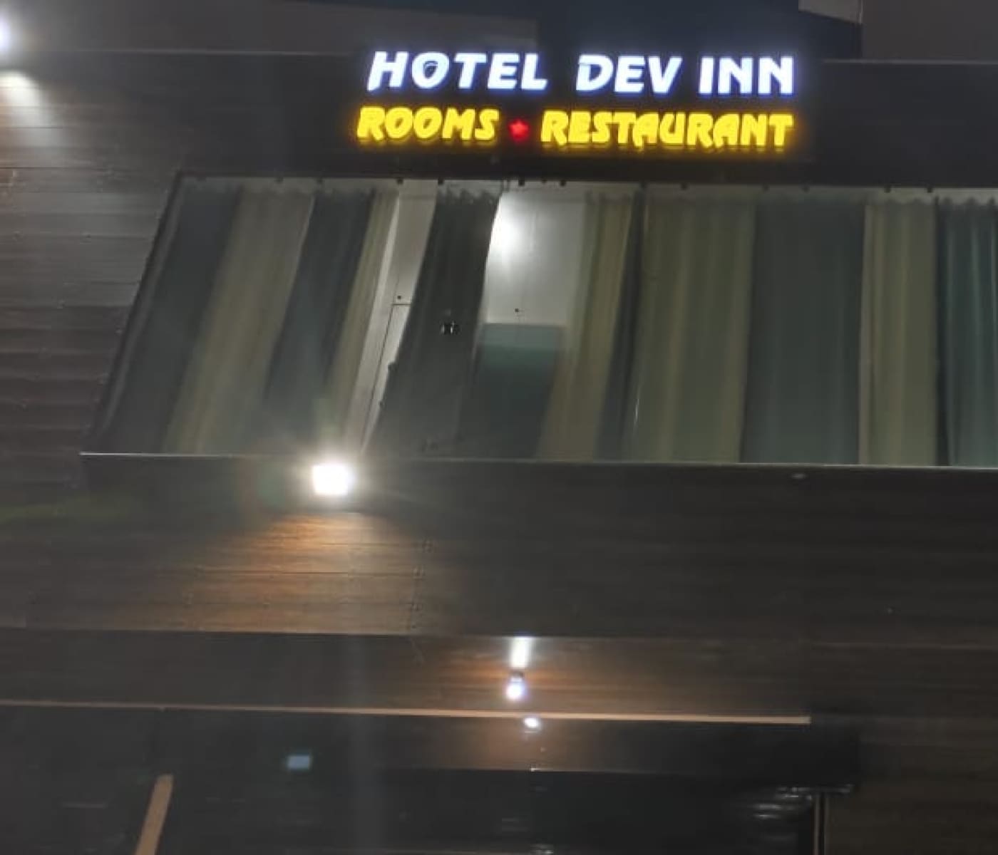 Hotel Dev Inn - Tap to explore photos