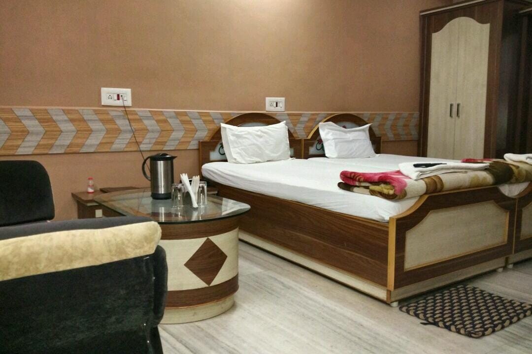 Hotel Sandhya Deluxe - Tap to explore photos