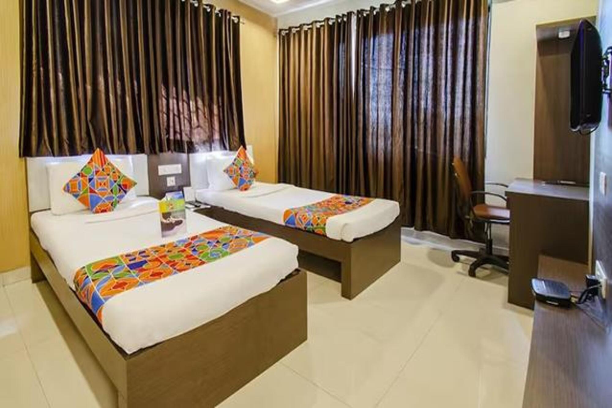 FabHotel Prime Sanket Inn - Tap to explore photos