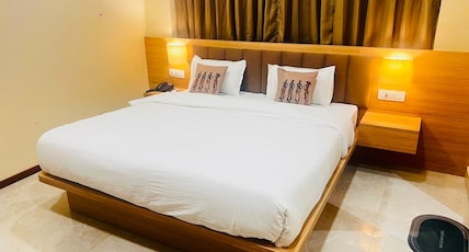 Arya Inn Room Type - DELUXE ROOM Arya Inn Room Type - DELUXE ROOM