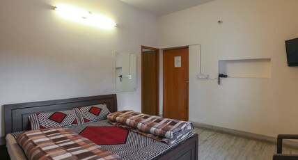 S J Residency Room Type - Deluxe AC Room