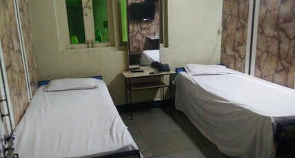 Novelty Guest House Room Type - Standard Non AC Room( Twin Sharing) - Unmarried Couple Not Allowed Novelty Guest House Room Type - Standard Non AC Room( Twin Sharing) - Unmarried Couple Not Allowed
