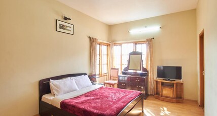 Rainbow Cottages-Budget Friendly Rooms & Restaurant Room Type - Double Cot Executive Room