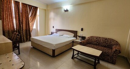 Hotel Vishal ( Near Yatra Parchi Counter) Room Type - Super Deluxe Room