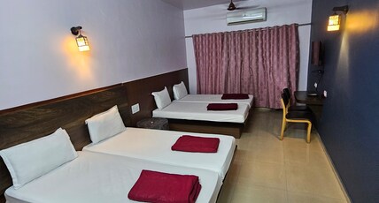 KINARA EXECUTIVE LODGE Room Type - Quadruple AC Room