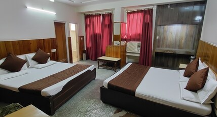 Hotel Raghunath  Room Type - Deluxe Four Bed Family room